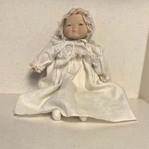 Vintage porcelain music doll